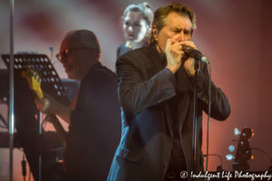 Bryan Ferry on the harmonica at Uptown Theater in Kansas City on March 24, 2017, Kansas City concert photography.
