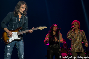 Guitarist John Roth with Stephanie Calvert and Mickey Thomas of Starship live in concert at Ameristar Casino in Kansas City, Missouri on June 10, 2017.