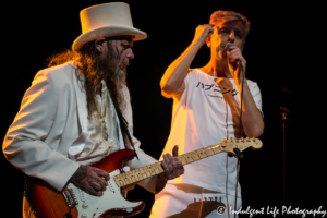 Modern English lead singer Robbie Grey and guitarist Gary McDowell live in concert on the Retro Futura 2017 tour in St. Charles, MO on August 19, 2017.