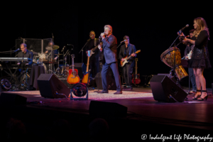 Peter Ceter and band singing "Glory of Love" live at Kauffman Center for the Performing Arts on February 18, 2018
