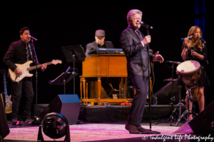 Peter Cetera with Chris Rodriguez on guitar, Big Woody on the synthesizer and Tania Hancheroff on percussion at Muriel Kauffman Theatre inside of Kauffman Center for the Performing Arts in Kansas City, MO on February 18, 2018.