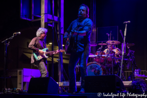 Restless Heart lead singer Larry Stewart with guitarist Greg Jennings and drummer John Dittrich live in concert at Festival on the Trails in Gardner, KS on June 9, 2018.