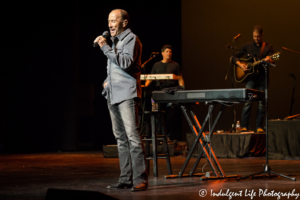Lee Greenwood performing live with guitarist Jeff Zona and keyboard player Doug Carter at Kauffman Center for the Performing Arts on July 1, 2018.
