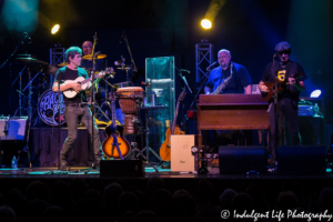 Kevin Bacon performing with drummer Frank Vilardi, bass guitarist Paul Guzzone and saxophone player Joe Mennonna of The Bacon Brothers at VooDoo Lounge in Harrah's North Kansas City Hotel & Casino on July 14, 2018.