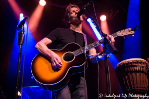 Kevin Bacon performing live on the acoustic guitar at Voodoo Lounge inside of Harrah's North Kansas City Hotel & Casino on July 14, 2018.