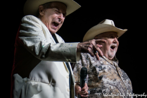 Legendary country and pop music artists Mickey Gilley and Johnny Lee together for the Urban Cowboy reunion show at Ameristar Casino in Kansas City, MO on July 13, 2018.