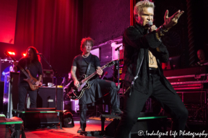 Billy Idol performing with guitarist Billy Morrison and bass guitar player Stephen McGrath at Uptown Theater in Kansas City, MO on September 21, 2018.
