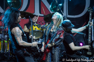 Lita Ford and band performing live at VooDoo Lounge inside of Harrah's North Kansas City Casino & Hotel on August 17, 2018.