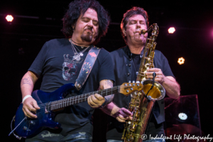 Toto guitarist Steve Lukather performing with saxophone player and backing vocalist Warren Ham at CrossroadsKC in Kansas City, MO on August 21, 2018.