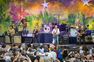 Ringo Starr performing on stage with His All-Starr Band members Steve Lukather, Warren Ham, Graham Gouldman, Gregg Bissonette and Colin Hay at Starlight Theatre in Kansas City, MO on September 3, 2018.