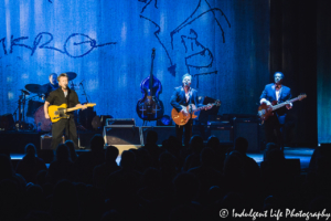 John Mellencamp performing live with drummer Dane Clark, guitarist Mike Wanchic and bass player John Gunnell at the Midland Theatre in Kansas City, MO on March 14, 2019.