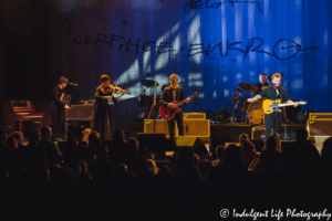 John Mellencamp live in concert with drummer Dane Clark, guitarist Andy York, violinist Miriam Strum and keyboard player Troye Kinnett at The Midland in Kansas City, MO on March 14, 2019.