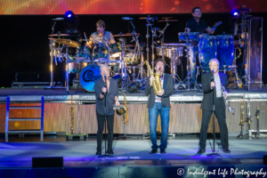 Chicago horn and percussion sections performing together live at Kansas City's Starlight Theatre on May 19, 2019.