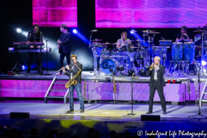 Chicago band member Ray Herrmann playing the flute on stage at Starlight Theatre in Kansas City, MO on May 19, 2019.