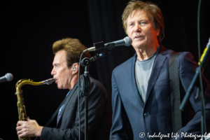 Chicago lead singer, keyboard player, guitarist and founding member Robert Lamm performing live with saxophone player Ray Herrmann at Starlight Theatre in Kansas City, MO on May 19, 2019.