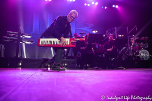 Chris Marion of LRB in concert on the keytar with drummer Ryan Ricks and a live orchestra at Ameristar Casino's Star Pavilion in Kansas City, MO on May 3, 2019.