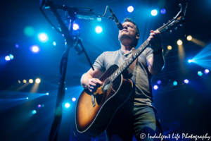 Colin Whinnery of Little River Band playing the acoustic guitar at Ameristar Casino's Star Pavilion in Kansas City, MO on May 3, 2019.