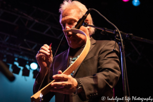 Vocalist and musician John Dillon of The Ozark Mountain Daredevils playing the musical bow at Ameristar Casino Hotel Kansas City on May 18, 2019.