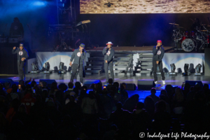 Mike Bivins, Bobby Brown, Ricky Bell and Ronnie DeVoe of New Edition together as RBRM at Kansas City's Starlight Theatre on May 9, 2019.