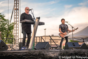 Frontman Mike Score and guitarist Gord Deppe of A Flock of Seagulls performing live at Town Center Plaza's Sunset Music Fest in Leawood, KS on June 27, 2019.