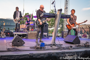 A Flock of Seagulls jamming in a headlining performance at Town Center Plaza's Sunset Music Fest in Leawood, KS on June 27, 2019.