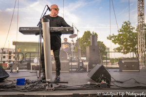 Lead singer and keyboard player Mike Score and drummer Kevin Rankin of A Flock of Seagulls performing together at Town Center Plaza's Sunset Music Fest in Leawood, KS on June 27, 2019.