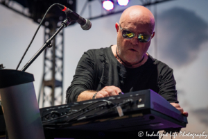 A Flock of Seagulls founder and lead vocalist Mike Score in a live festival performance at Town Center Plaza's Sunset Music Fest in Leawood, KS on June 27, 2019.