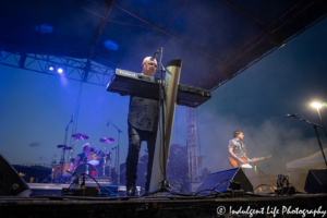 Found and frontman Mike Score of A Flock of Seagulls performing with bandmates Kevin Rankin on drums and Gord Deppe on guitar at Sunset Music Fest in Leawood, KS on June 27, 2019.