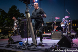 A Flock of Seagulls band member Mike Score, Pando and Kevin Rankin playing "I Ran" at Town Center Plaza's Sunset Music Fest in Leawood, KS on June 27, 2019.