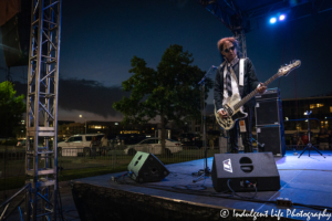 Bass player Pando in a live encore performance at Town Center Plaza's Sunset Music Fest in Leawood, KS on June 27, 2019.