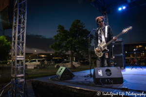 Bass player Pando in a live encore performance at Town Center Plaza's Sunset Music Fest in Leawood, KS on June 27, 2019.