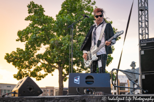 Bass player Pando of A Flock of Seagulls in a live performance at Sunset Music Fest on the Town Center Plaza in Leawood, KS on June 27, 2019.