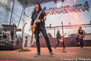 Night Ranger's Keri Kelli on guitar solo at the Missouri State Fair in Sedalia, MO on August 16, 2019.