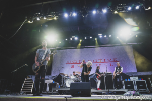 Collective Soul guitarist Jesse Triplett performing a solo at Azura Amphitheater in Bonner Springs, KS on June 25, 2021.