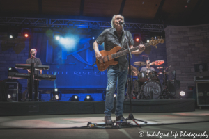 Frontman Wayne Nelson of LRB performing live with keyboard player Chris Marion and drummer Ryan Ricks at CRMU Amphitheater in Jefferson City, MO on June 4, 2021.