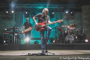 Frontman Wayne Nelson of Little River Band playing the bass guitar at Capital Region MU Health Care Amphitheater at Riverside Park in Jefferson City, MO on June 4, 2021.