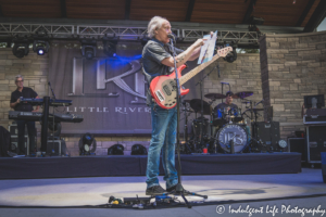 Wayne Nelson sharing the proclamation declaring June 4 as Little River Band Day in the River City during the band's concert at Riverside Park Amphitheater.