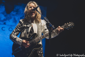 Guitarist Tommy Shaw of Styx singing live at Azura Amphitheater in Bonner Springs, KS on June 25, 2021.