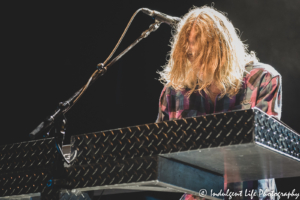 Band member Jeff Pilson of Foreigner playing the keyboard live at Hartman Arena in Park City, KS on August 7, 2021.