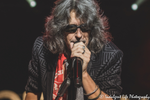 Frontman Kelly Hansen of Foreigner singing "Double Vision" live at Hartman Arena in Wichita suburb Park City, KS on August 7, 2021.