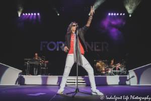 Frontman Kelly Hansen of Foreigner singing "Double Vision" live in concert at Hartman Arena in Park City, KS on August 7, 2021.