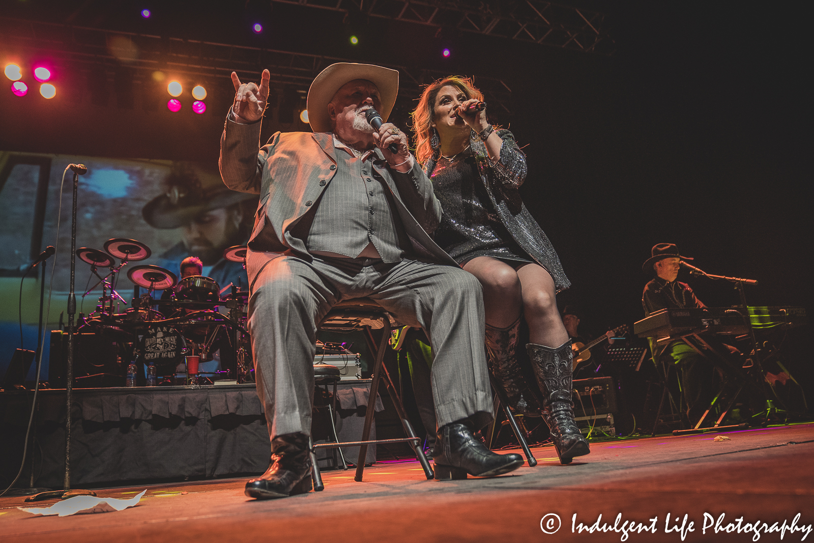 Johnny Lee and his Urban Cowboy band backup singer live in concert together at Ameristar Casino's Star Pavilion in Kansas City, MO on November 13, 2021.
