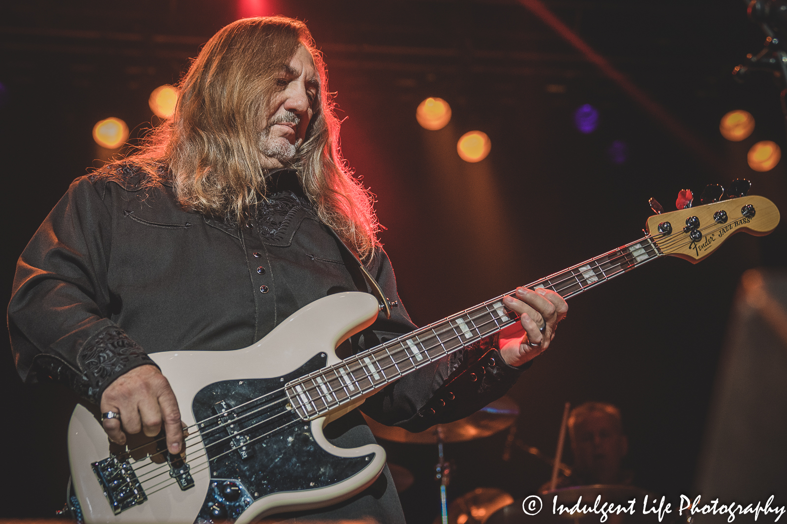 Bass guitarist Dean Foltz of Missouri performing live at Ameristar Casino Hotel Kansas City on April 9, 2022.