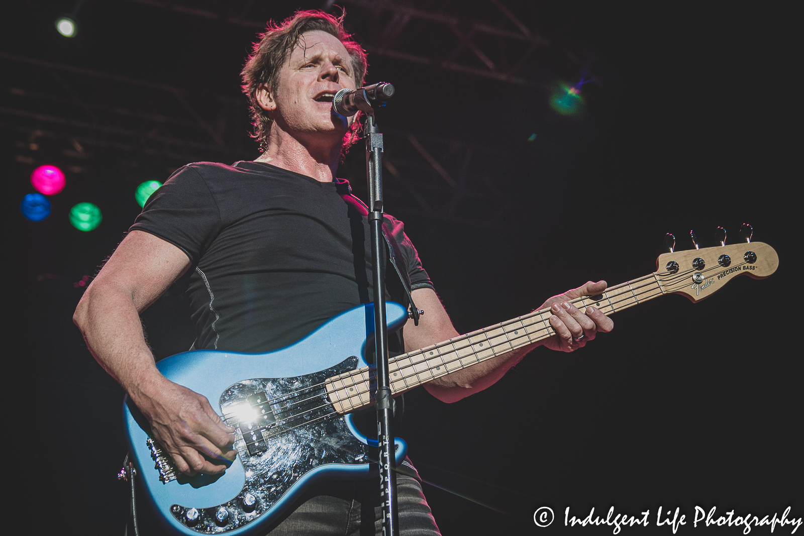 Lead singer Todd Pettygrove of Shooting Star on bass guitar and performing at Star Pavilion inside of Ameristar Casino in Kansas City, MO on April 9, 2022.