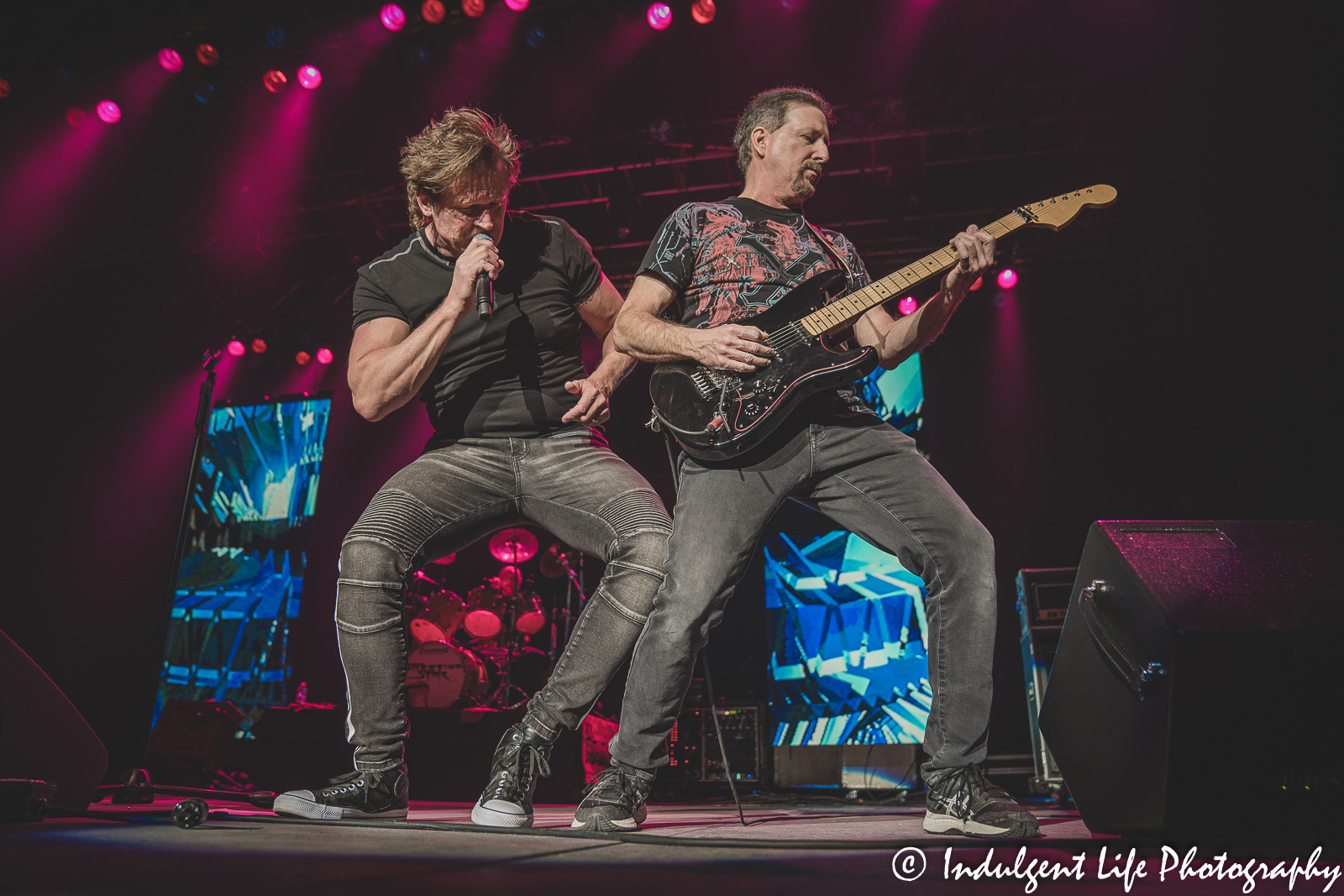 Lead singer Todd Pettygrove of Shooting Star performing with guitarist Chet Galloway and drummer Steve Thomas at Ameristar Casino's Star Pavilion in Kansas City, MO on April 9, 2022.