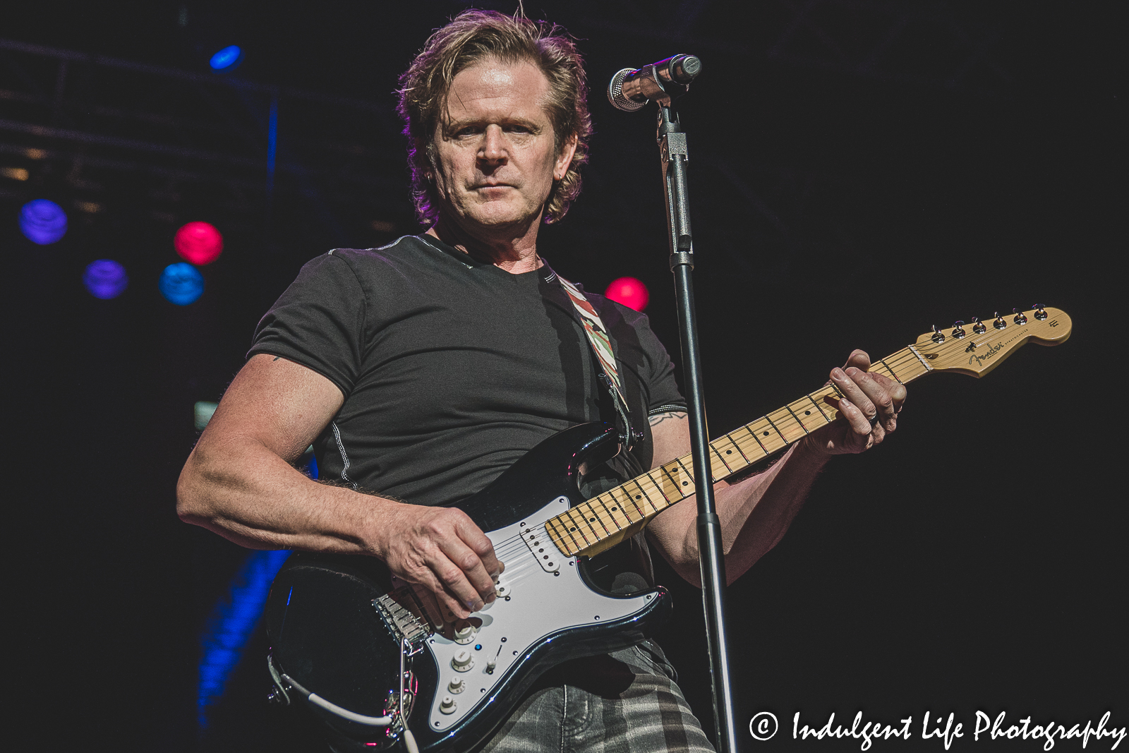 Shooting Star frontman Todd Pettygrove on guitar and performing at Ameristar Casino's Star Pavilion in Kansas City, MO on April 9, 2022.
