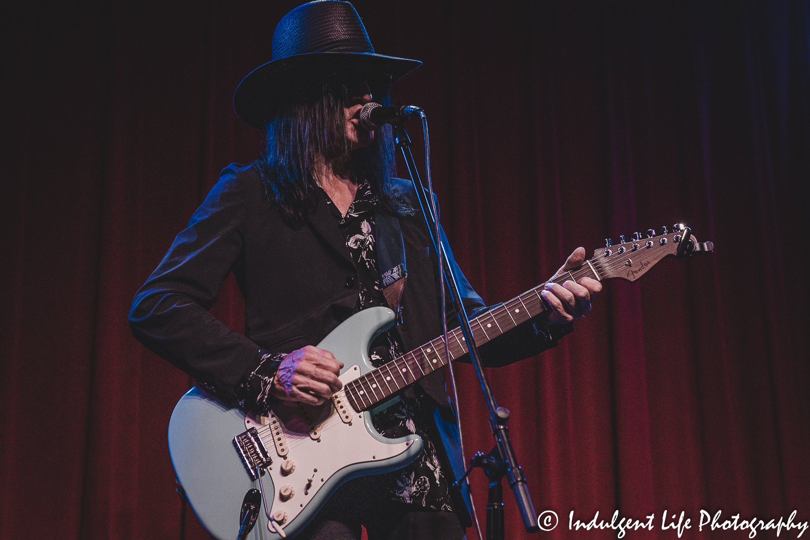 Lead singer Jay Aston of Gene Loves Jezebel playing the guitar at the recordBar in the Crossroads of Kansas City, MO on May 26, 2022.