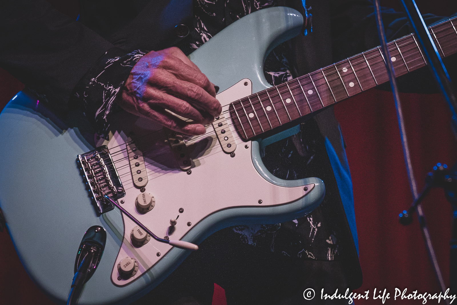 Gene Loves Jezebel lead singer Jay Aston playing the guitar at the recordBar in downtown Kansas City, MO on May 26, 2022.