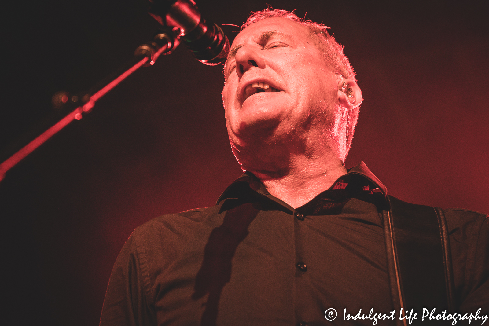Lead singer and bass player Andy McCluskey of OMD singing live at The Truman in downtown Kansas City, MO on May 8, 2022.