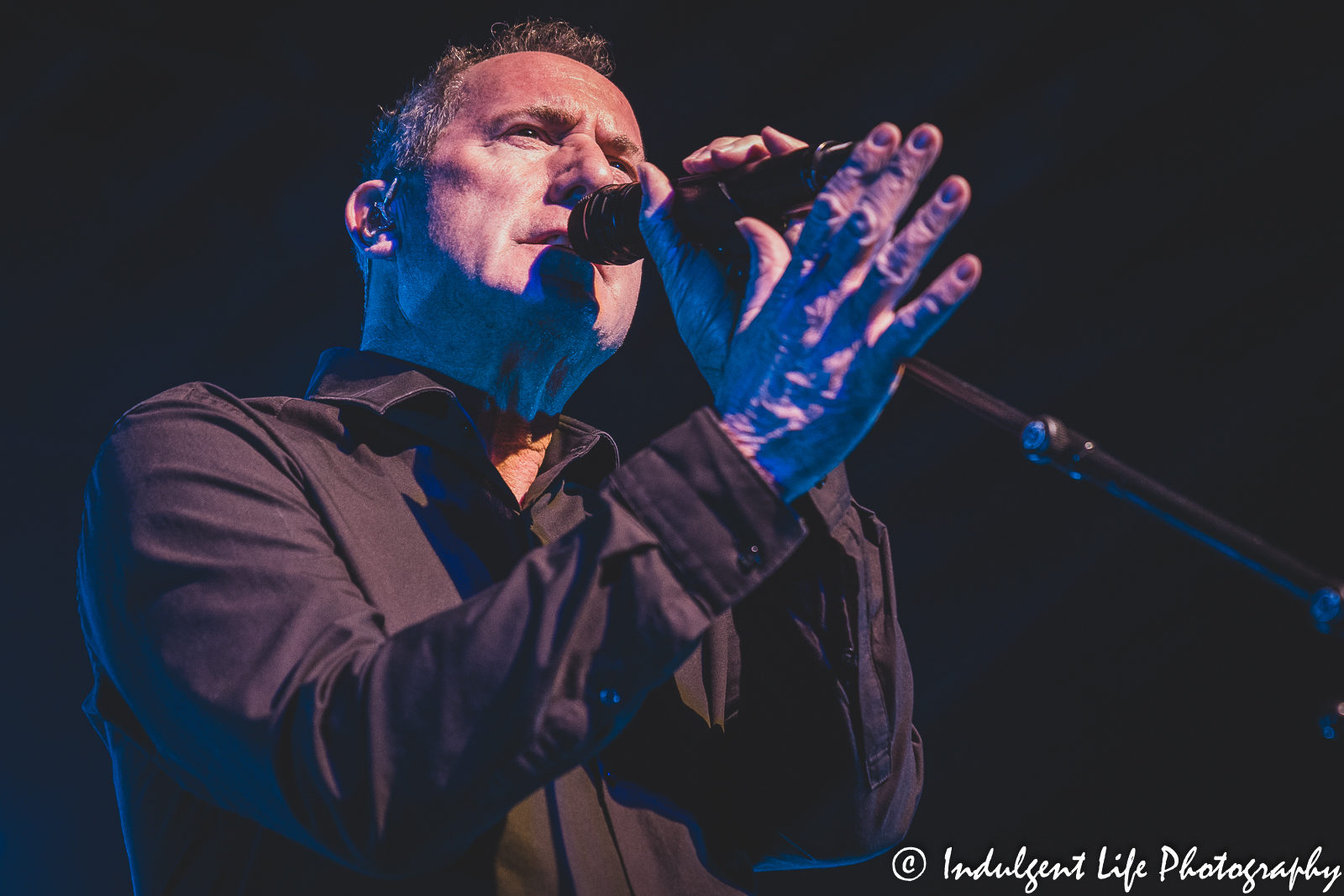 OMD lead singer Andy McCluskey singing live at The Truman in downtown Kansas City, MO on May 8, 2022.